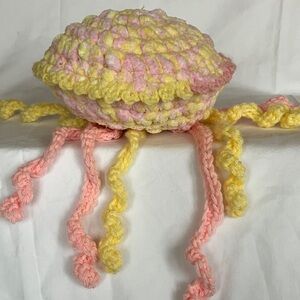 Handmade Pink and Yellow Crochet Jellyfish Plush.
New. 8” across.